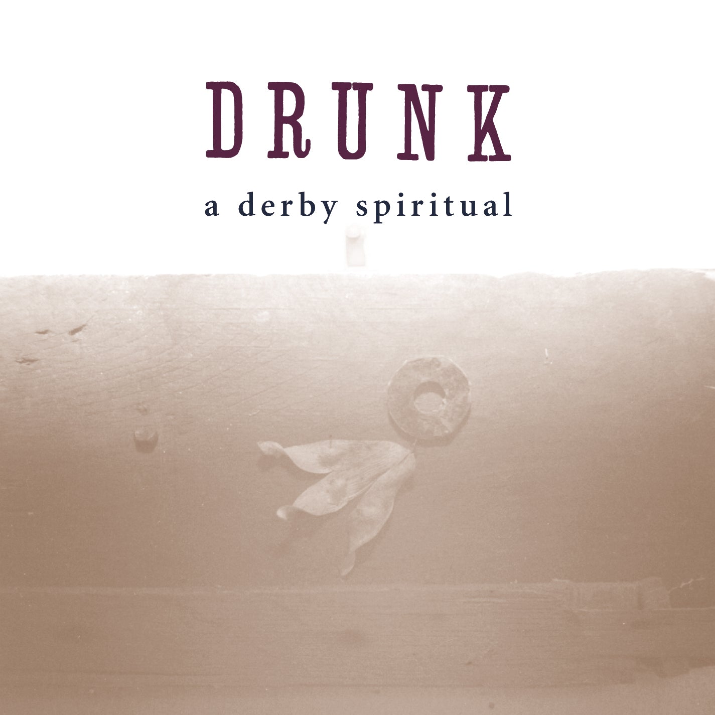 Minimalist album cover with faded floral design featuring the text DRUNK and A Derby Spiritual in simple fonts