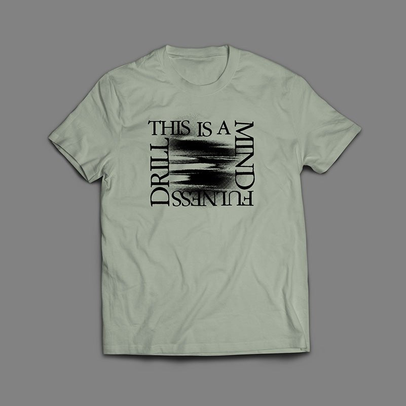 This is a Mindfulness Drill Black On Sage T-Shirt - Secretly Store