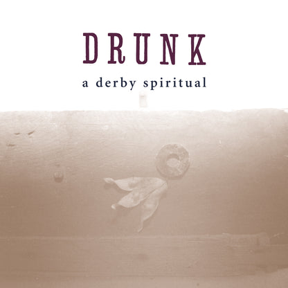 Minimalist album cover with faded floral design featuring the text DRUNK and A Derby Spiritual in simple fonts